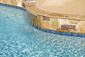 a,water,feature,and,flagstone,is,shown,on,a,suburban
